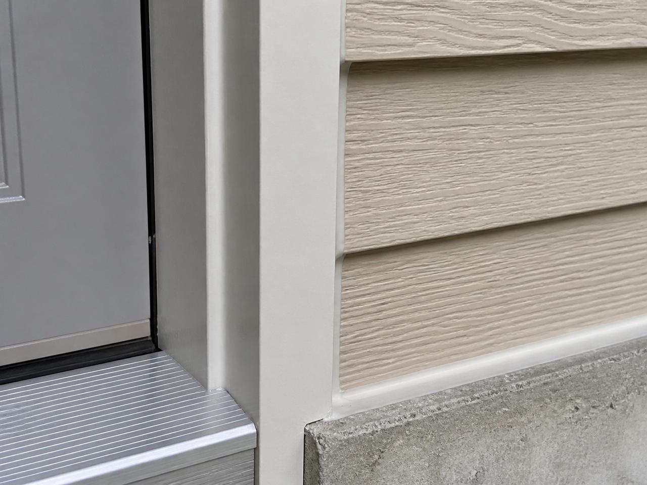Sealant applied at siding and trim transitions