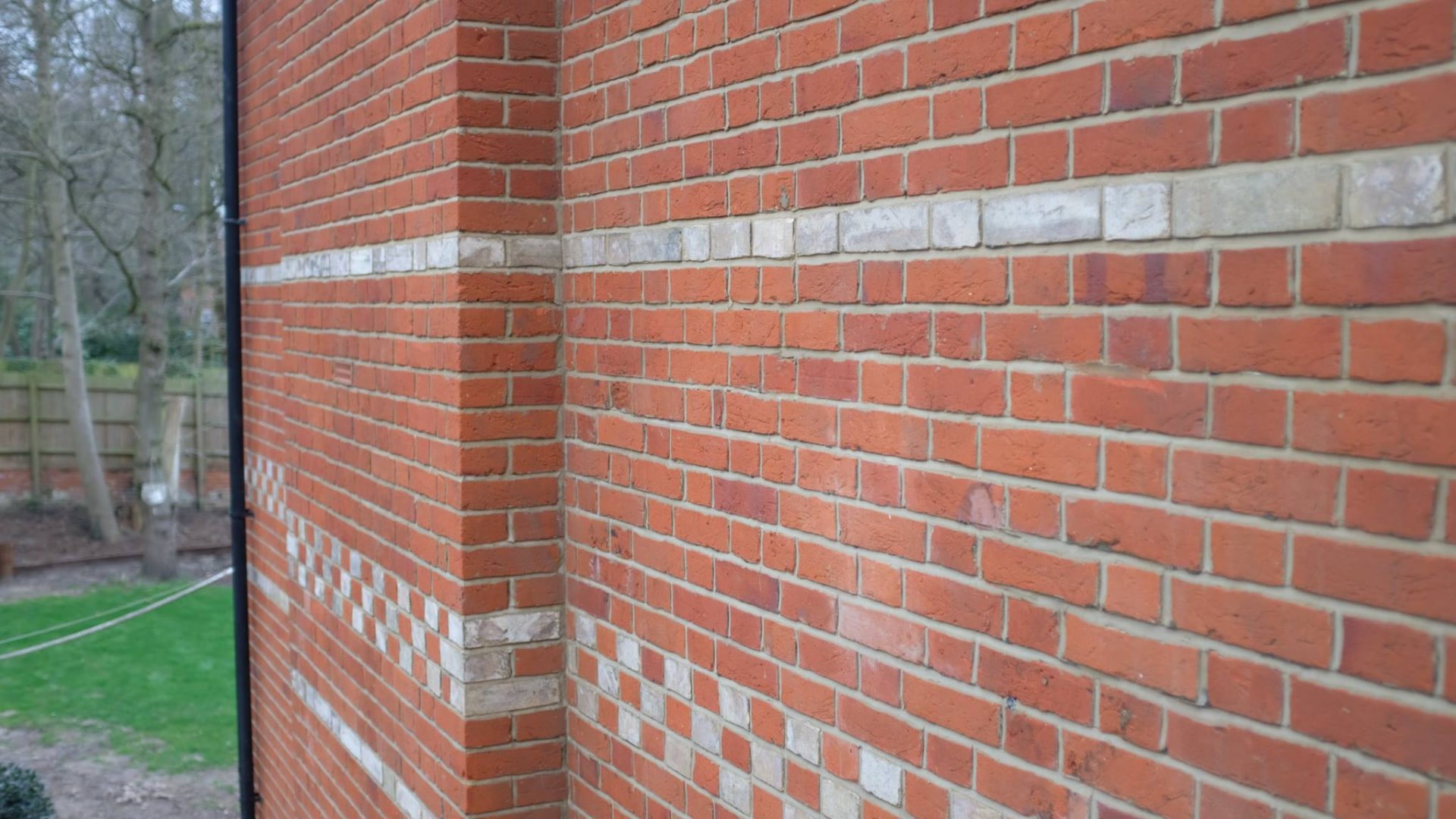 Mortar joints raked and repacked on a historic brick wall